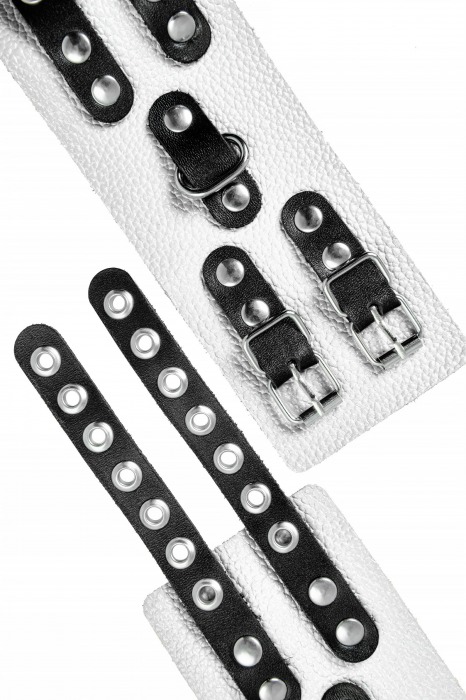 Бело-черные наручники с двумя ремешками и люверсами - Pecado - купить с доставкой в Уссурийске